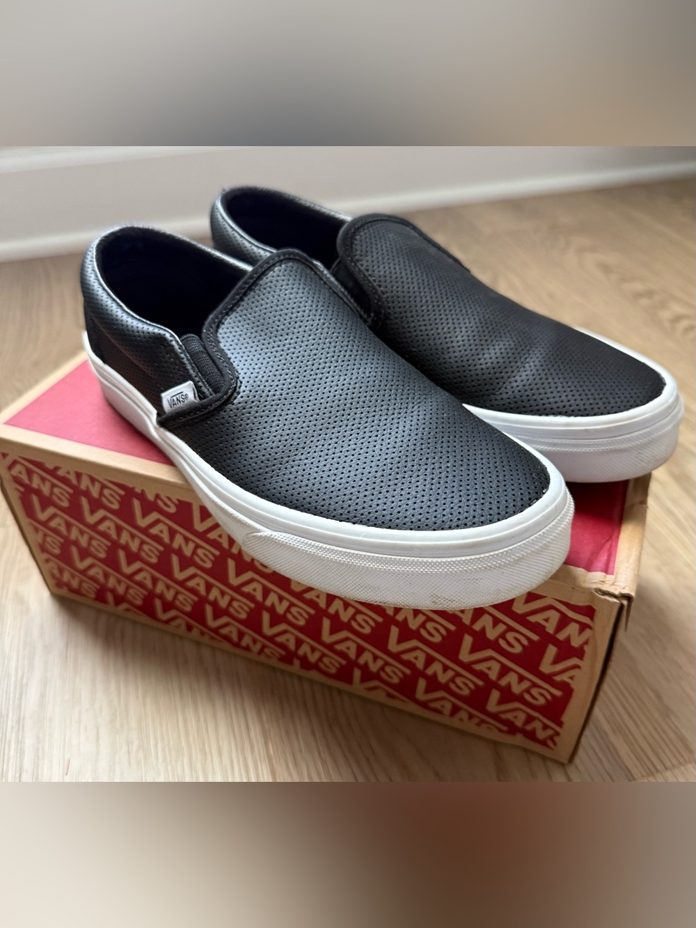 Vans Black Perforated Leather Slip-On Sneakers